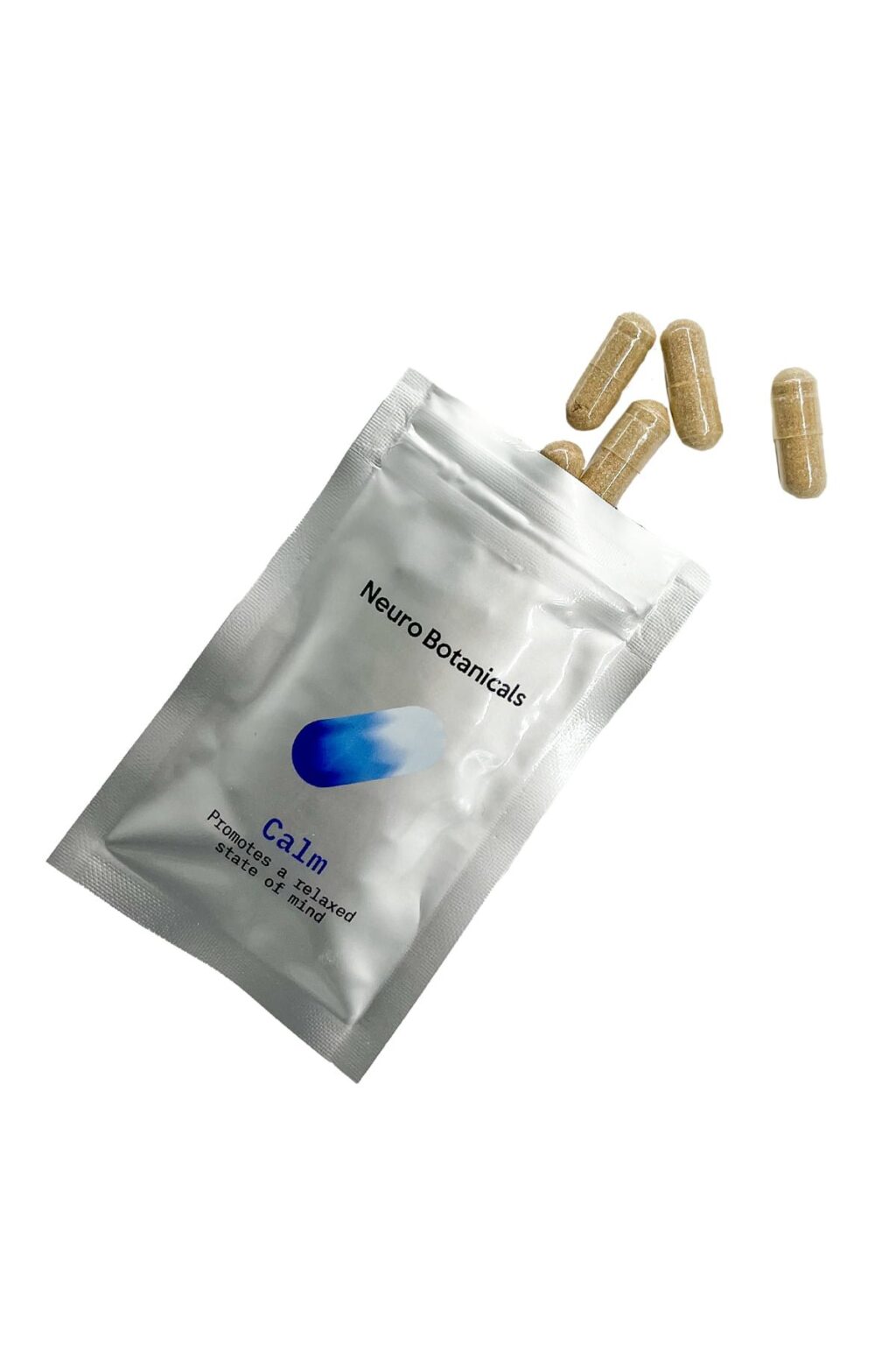 Close up of uniform clear vegetable capsules filled with a finely ground Calm blend botanical powder
